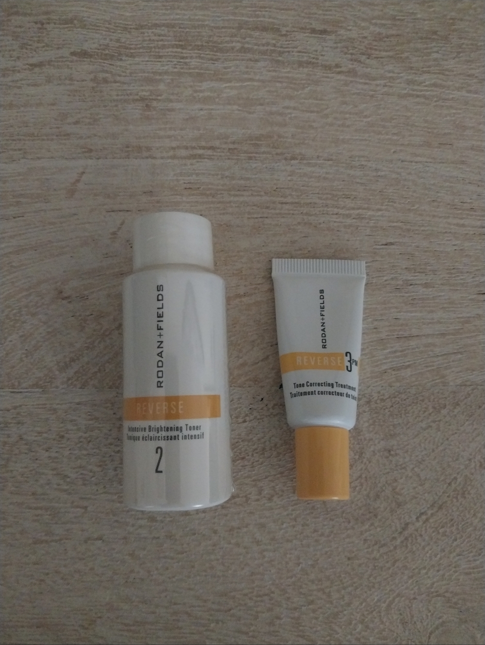 Rodan + Fields Reverse Toner and Treatment - White and Yellow